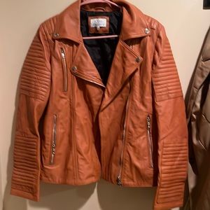 Orange Texas Johnny faux leather moto jacket. Worn once. Great condition.